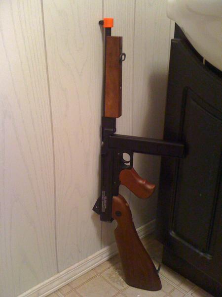 One half of my newest additions to my Airsoft family. Bought this M1A1 Thompson from Venture Airsoft, will be using this one for my WWII re-enacting and possibly for an airsoft game here and there.